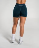 Amplify Mid Rise Short in Deep Sea – Alphalete women's shorts