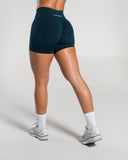 Amplify Mid Rise Short in Deep Sea – women's mid-rise seamless compression shorts