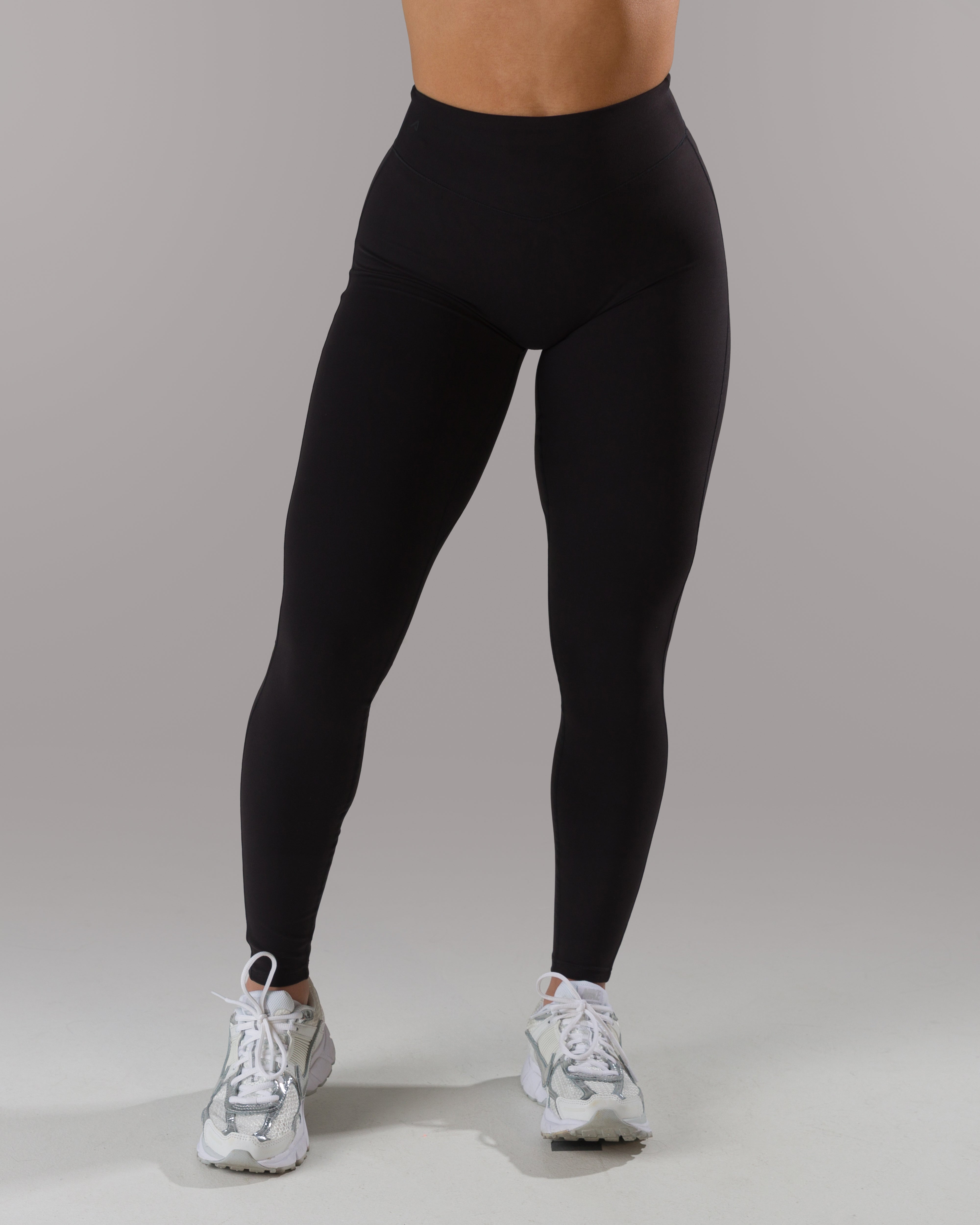 Dip Back Mid Rise Legging - Black | Workout Leggings | Alphalete